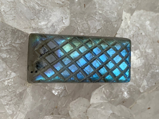 Labradorite, engraved cabochon of 31mm x 14 x 7. AA to AAA quality, perfect for mounting in jewelry or collection!
