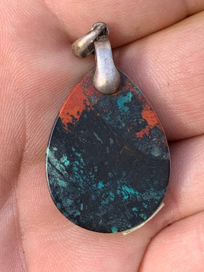 Chrysocolla! Unique silver pendant, 42mm high x 22mm wide x 5mm thick. Sold with an adjustable black cord. Made by Gen &amp; Zen!