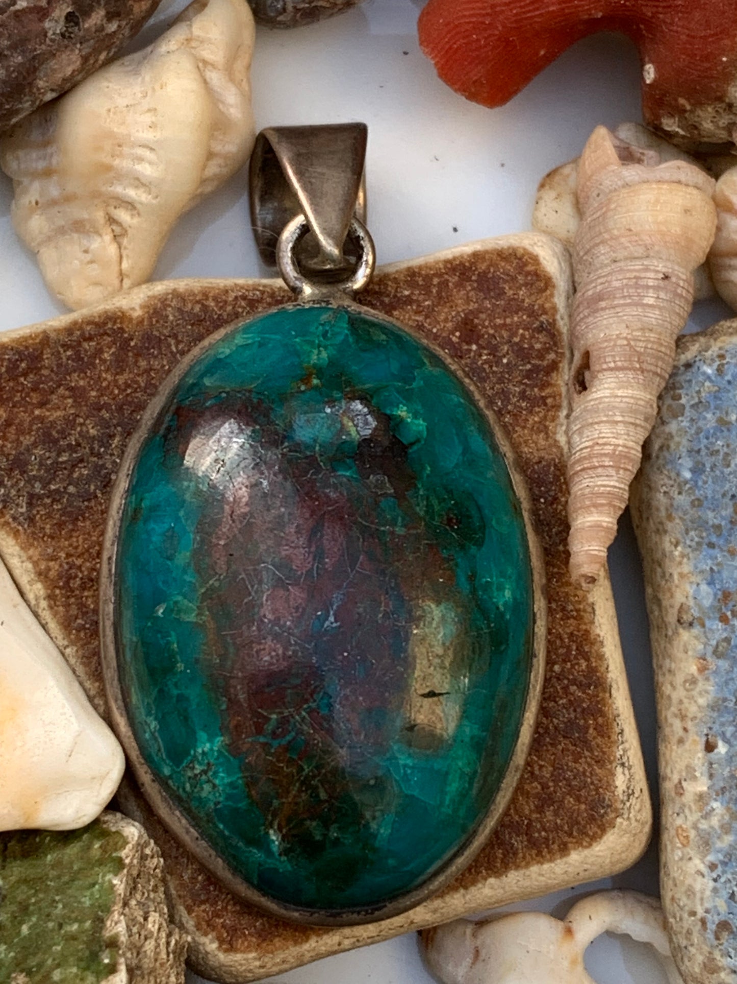 Chrysocolla! Unique silver pendant, 45mm high x 21mm wide x 10mm thick. Sold with an adjustable black cord. Made by Gen &amp; Zen!