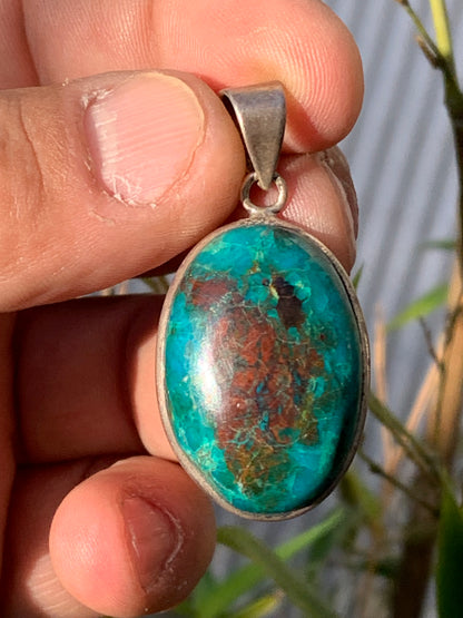 Chrysocolla! Unique silver pendant, 45mm high x 21mm wide x 10mm thick. Sold with an adjustable black cord. Made by Gen &amp; Zen!