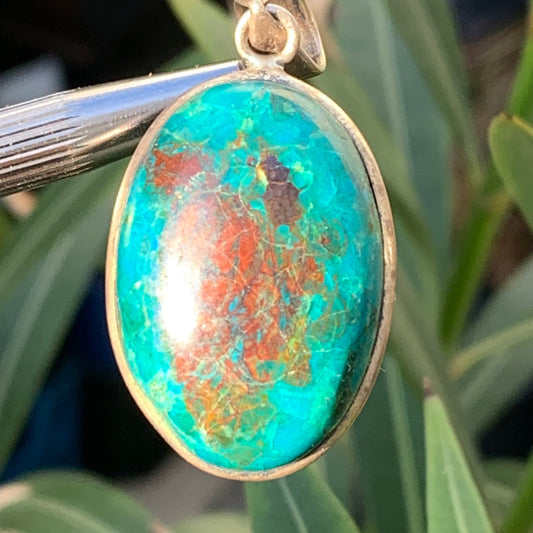 Chrysocolla! Unique silver pendant, 45mm high x 21mm wide x 10mm thick. Sold with an adjustable black cord. Made by Gen &amp; Zen!