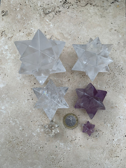 Etoile de Sirius (12 branches) en cristal de roche/ quartz et améthyste. Modèle au choix vendu à l'unité, de 1,5 à 6 cm. Parfait pour l'étude de la géométrie sacré et ses applications !