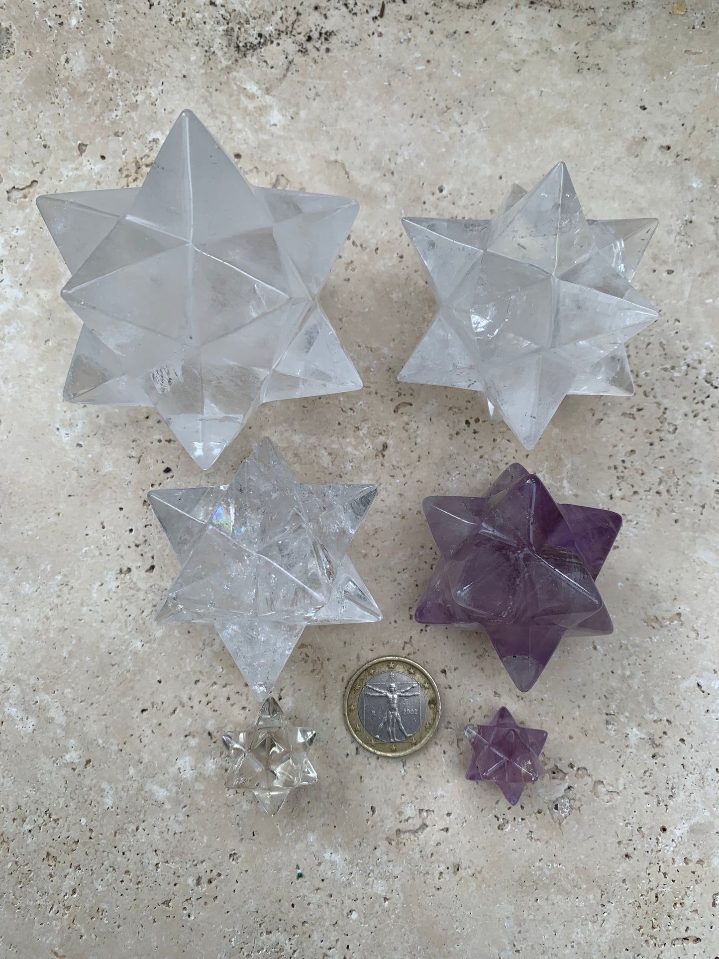 Etoile de Sirius (12 branches) en cristal de roche/ quartz et améthyste. Modèle au choix vendu à l'unité, de 1,5 à 6 cm. Parfait pour l'étude de la géométrie sacré et ses applications !