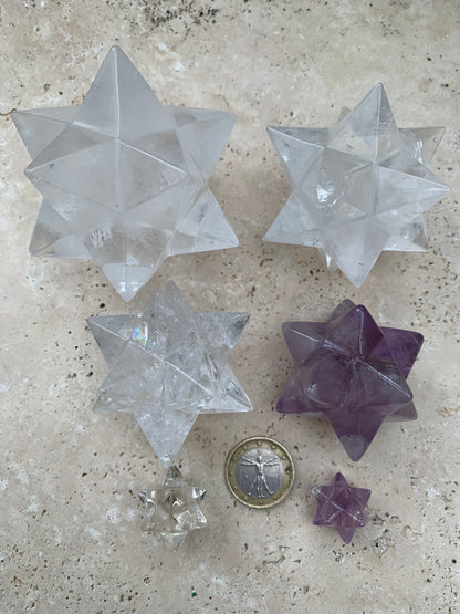 Etoile de Sirius (12 branches) en cristal de roche/ quartz et améthyste. Modèle au choix vendu à l'unité, de 1,5 à 6 cm. Parfait pour l'étude de la géométrie sacré et ses applications !