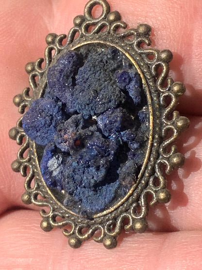 Azurite, bronze-colored brass pendant with beautiful natural crystals, 37mm high x 30 wide x 8 thick. Sold with a free adjustable black cord!