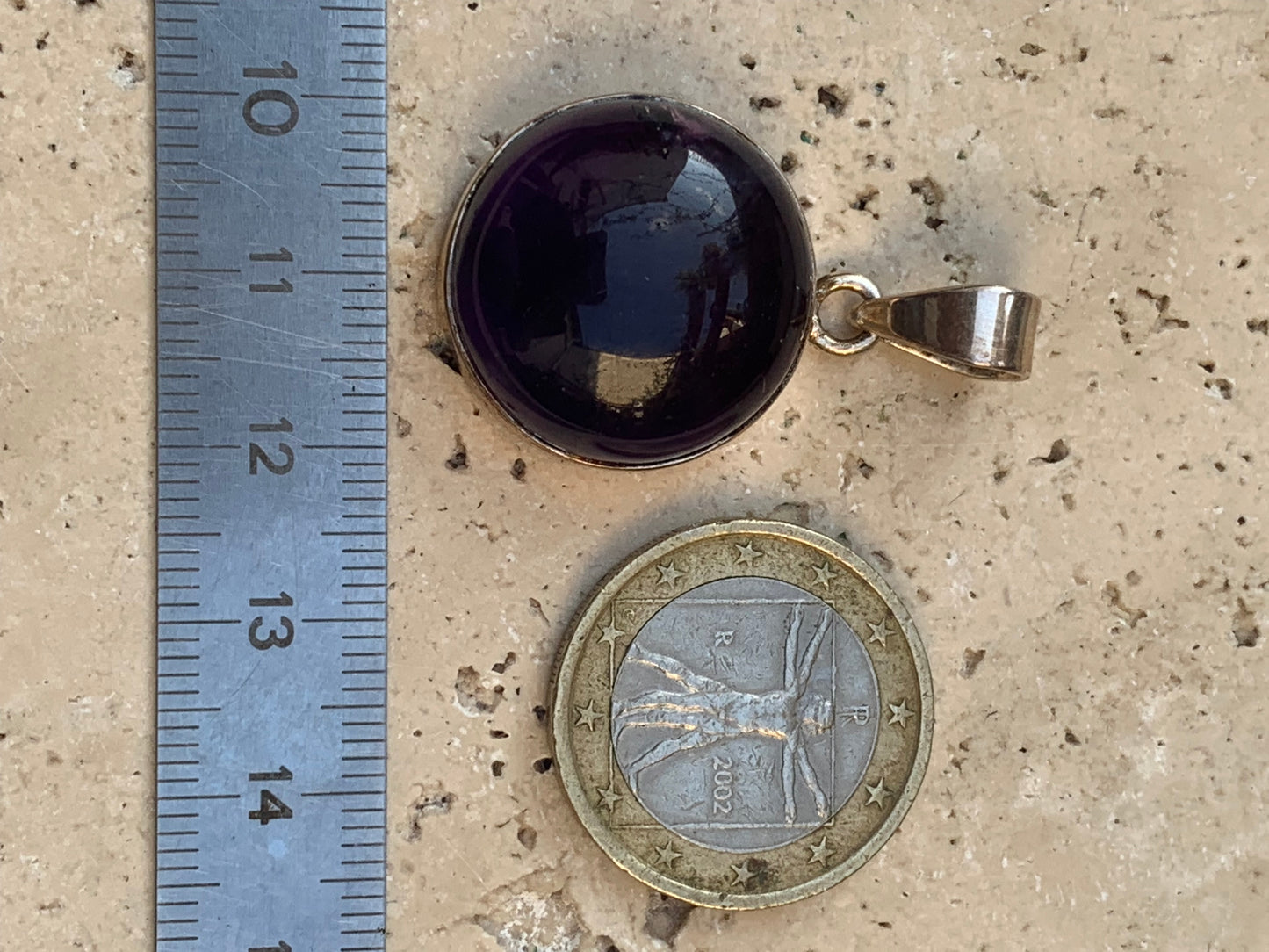 Amethyst, Silver pendant, 34 mm high x 22 mm wide x 10 mm thick. Sold with a free adjustable black cord!