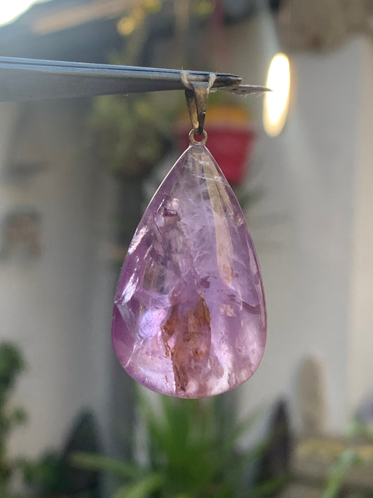 Amethyst, 'drop' pendant, 42mm high x 20mm wide x 11mm thick. Sold with a free adjustable black cord!