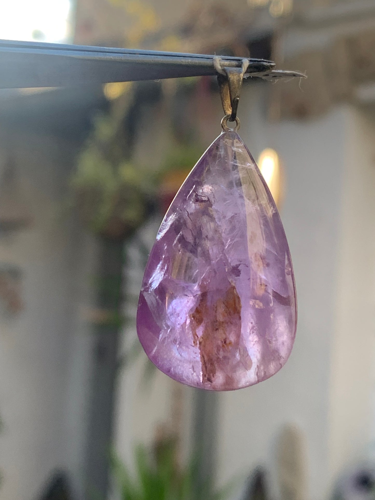 Amethyst, 'drop' pendant, 42mm high x 20mm wide x 11mm thick. Sold with a free adjustable black cord!