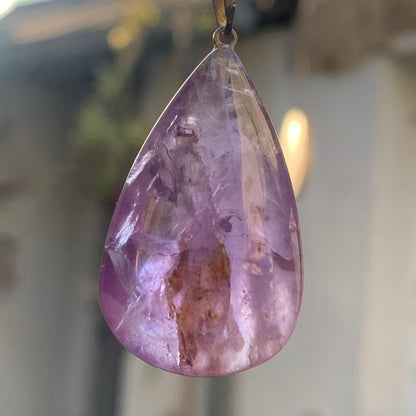Amethyst, 'drop' pendant, 42mm high x 20mm wide x 11mm thick. Sold with a free adjustable black cord!