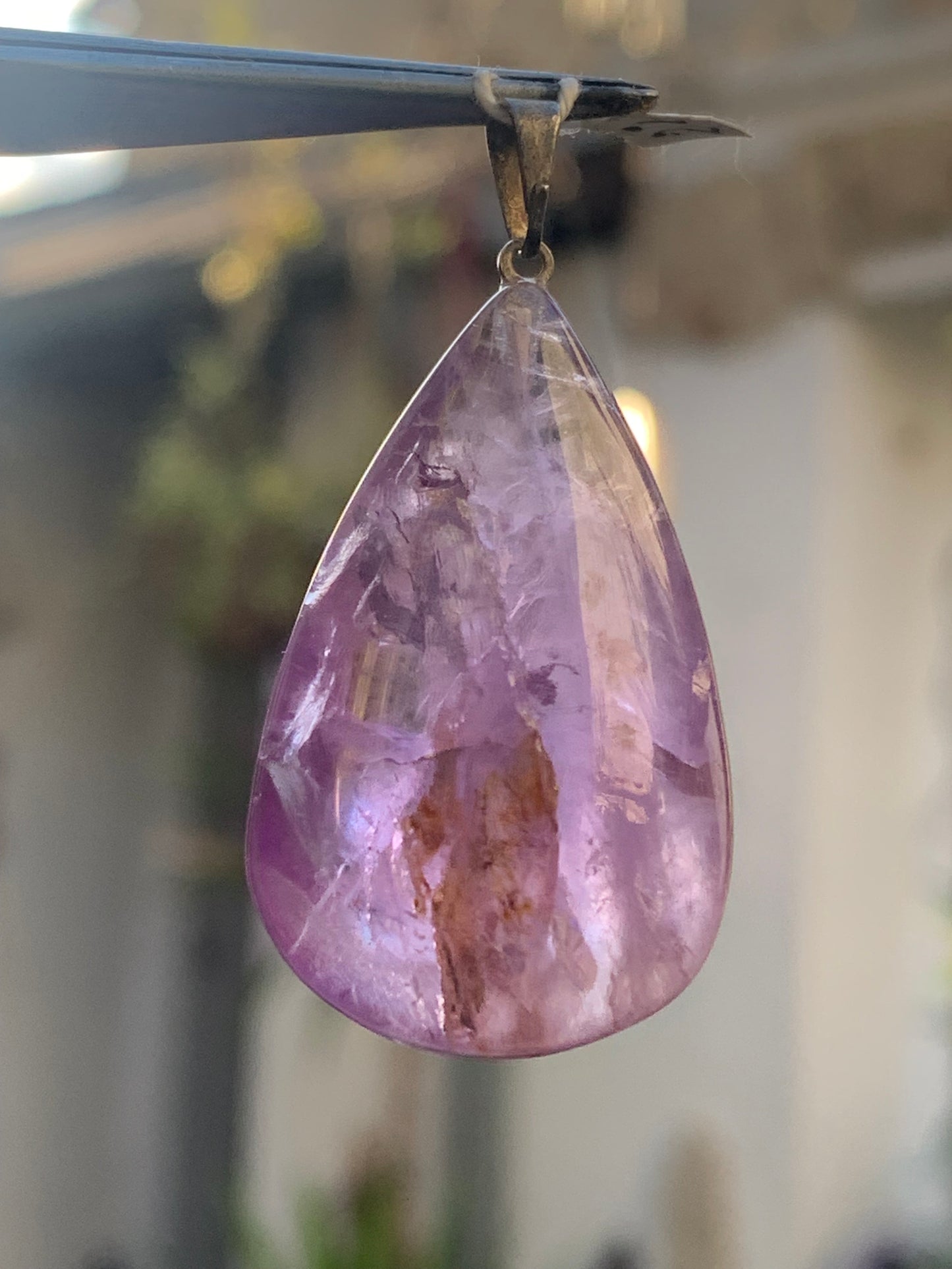 Amethyst, 'drop' pendant, 42mm high x 20mm wide x 11mm thick. Sold with a free adjustable black cord!