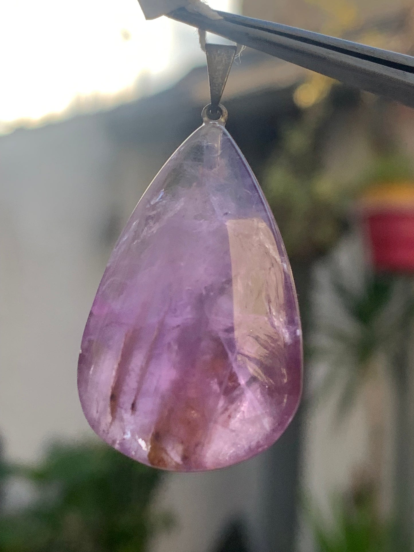 Amethyst, 'drop' pendant, 42mm high x 20mm wide x 11mm thick. Sold with a free adjustable black cord!