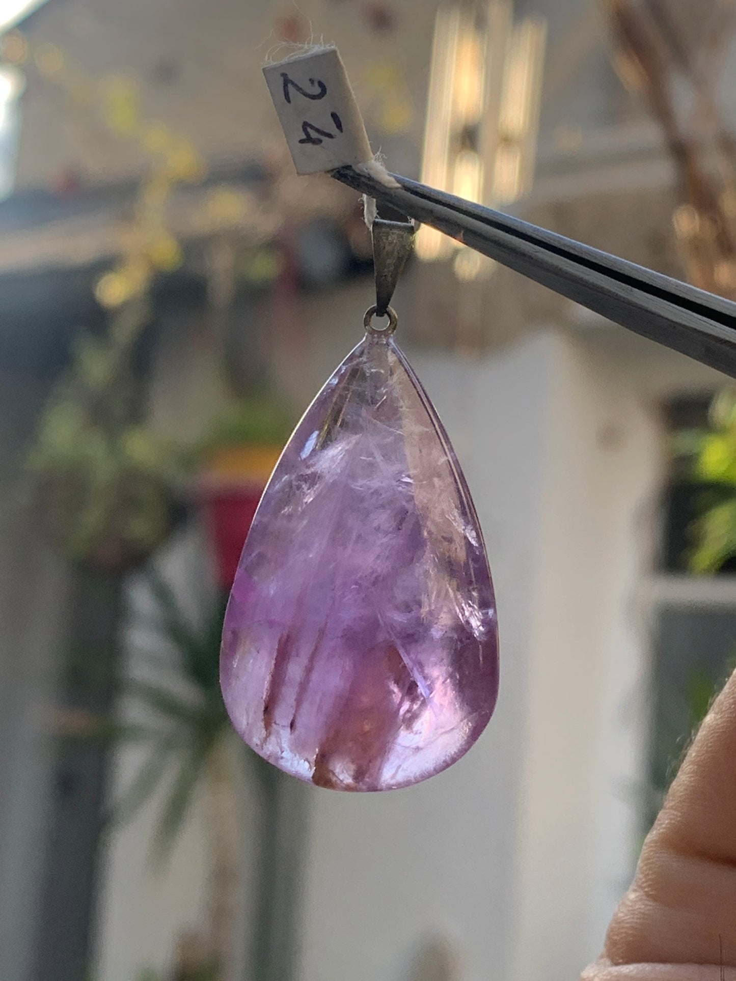 Amethyst, 'drop' pendant, 42mm high x 20mm wide x 11mm thick. Sold with a free adjustable black cord!