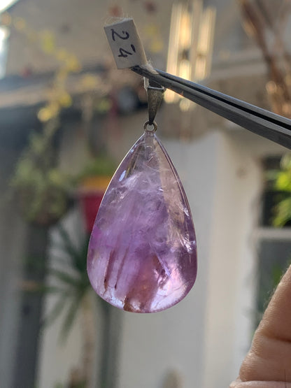 Amethyst, 'drop' pendant, 42mm high x 20mm wide x 11mm thick. Sold with a free adjustable black cord!