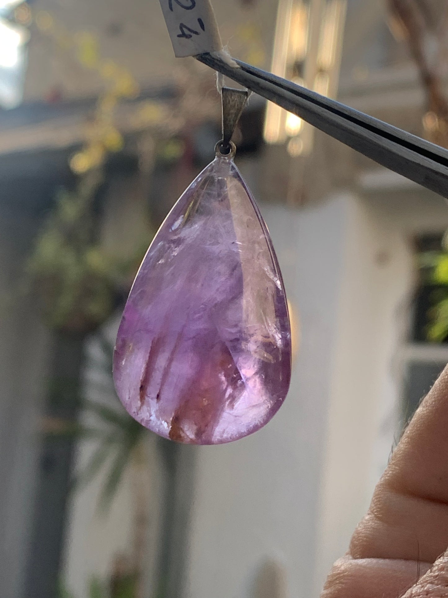Amethyst, 'drop' pendant, 42mm high x 20mm wide x 11mm thick. Sold with a free adjustable black cord!