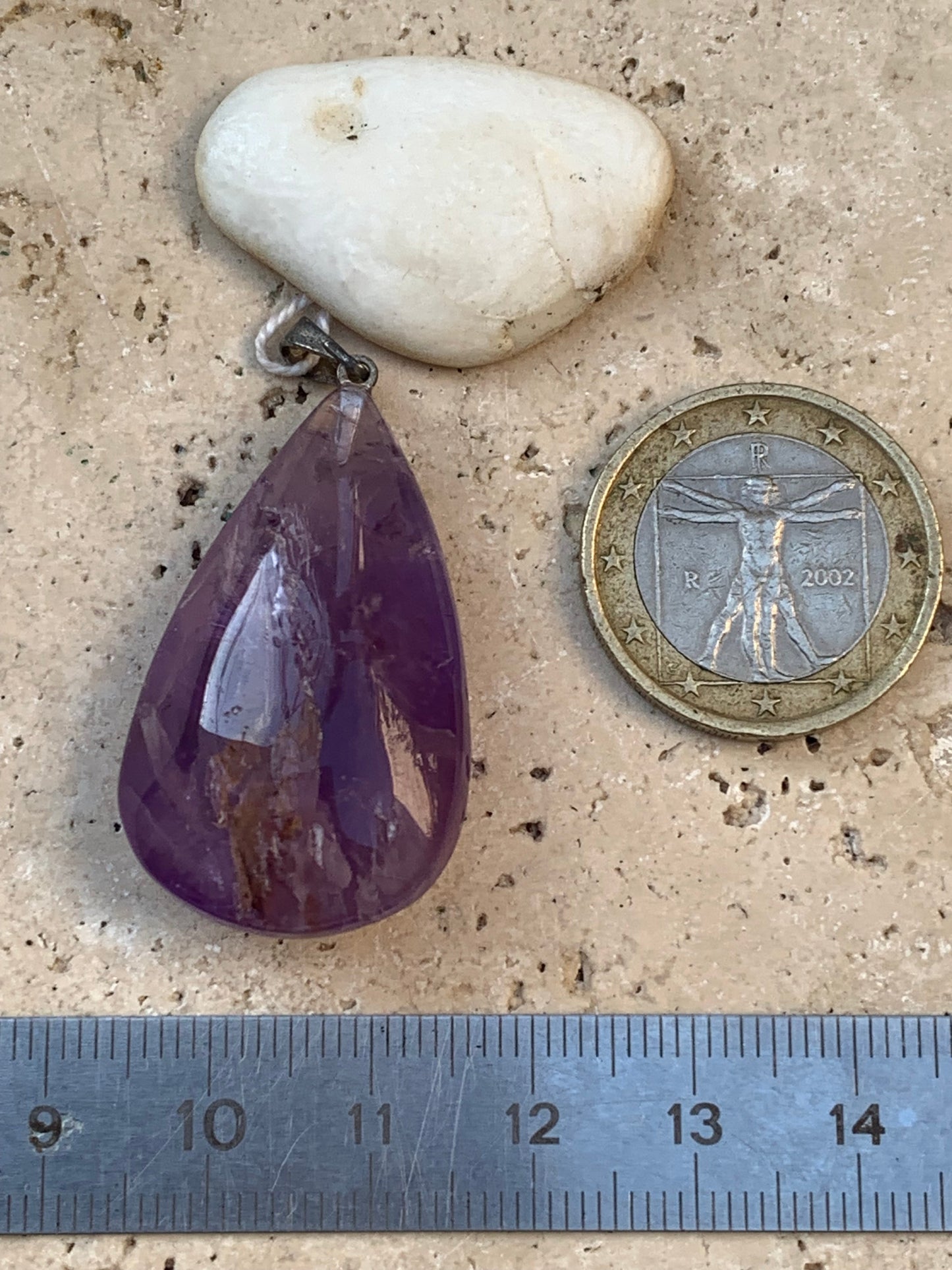 Amethyst, 'drop' pendant, 42mm high x 20mm wide x 11mm thick. Sold with a free adjustable black cord!