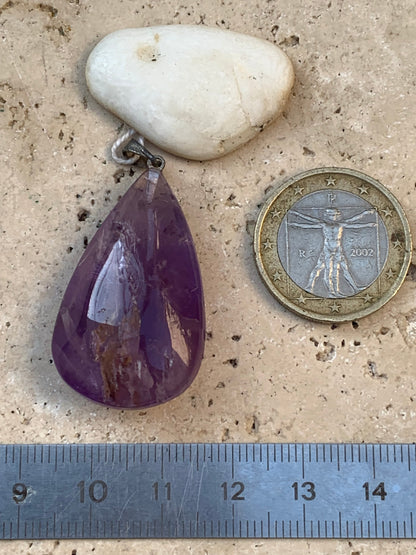 Amethyst, 'drop' pendant, 42mm high x 20mm wide x 11mm thick. Sold with a free adjustable black cord!
