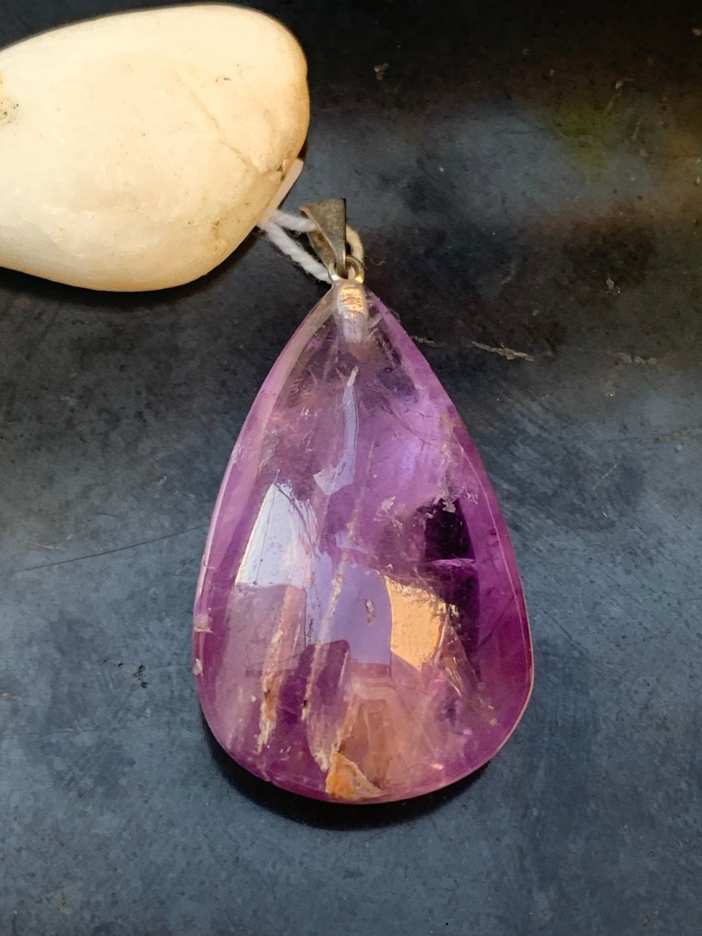 Amethyst, 'drop' pendant, 42mm high x 20mm wide x 11mm thick. Sold with a free adjustable black cord!