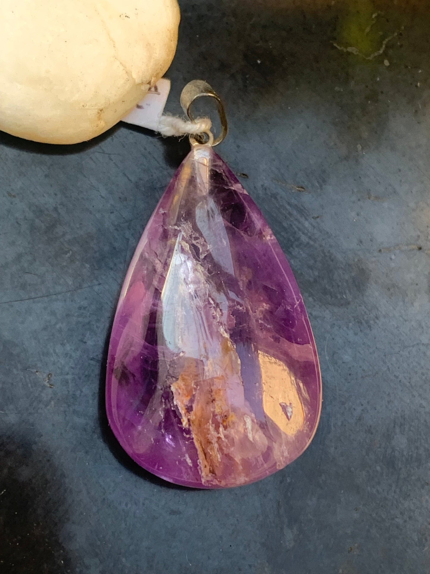 Amethyst, 'drop' pendant, 42mm high x 20mm wide x 11mm thick. Sold with a free adjustable black cord!