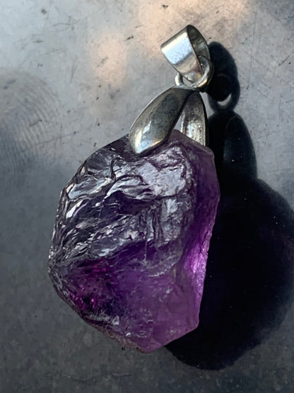 Amethyst, 'crystal' pendant, 40mm high x 20mm wide x 12mm thick. Sold with a free adjustable black cord!