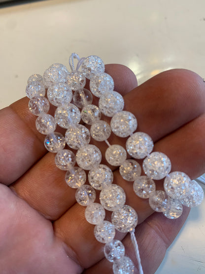 Cristal de roche 'Craquelé' ou 'Neige' (Quartz), perles rondes de 4, 6, 8, 10, 12, 14 mm. Vendu en fil de perle 38/39 cm, en bracelet de 17 à 21 cm, en collier de 45 ou sautoir de 60 cm !
