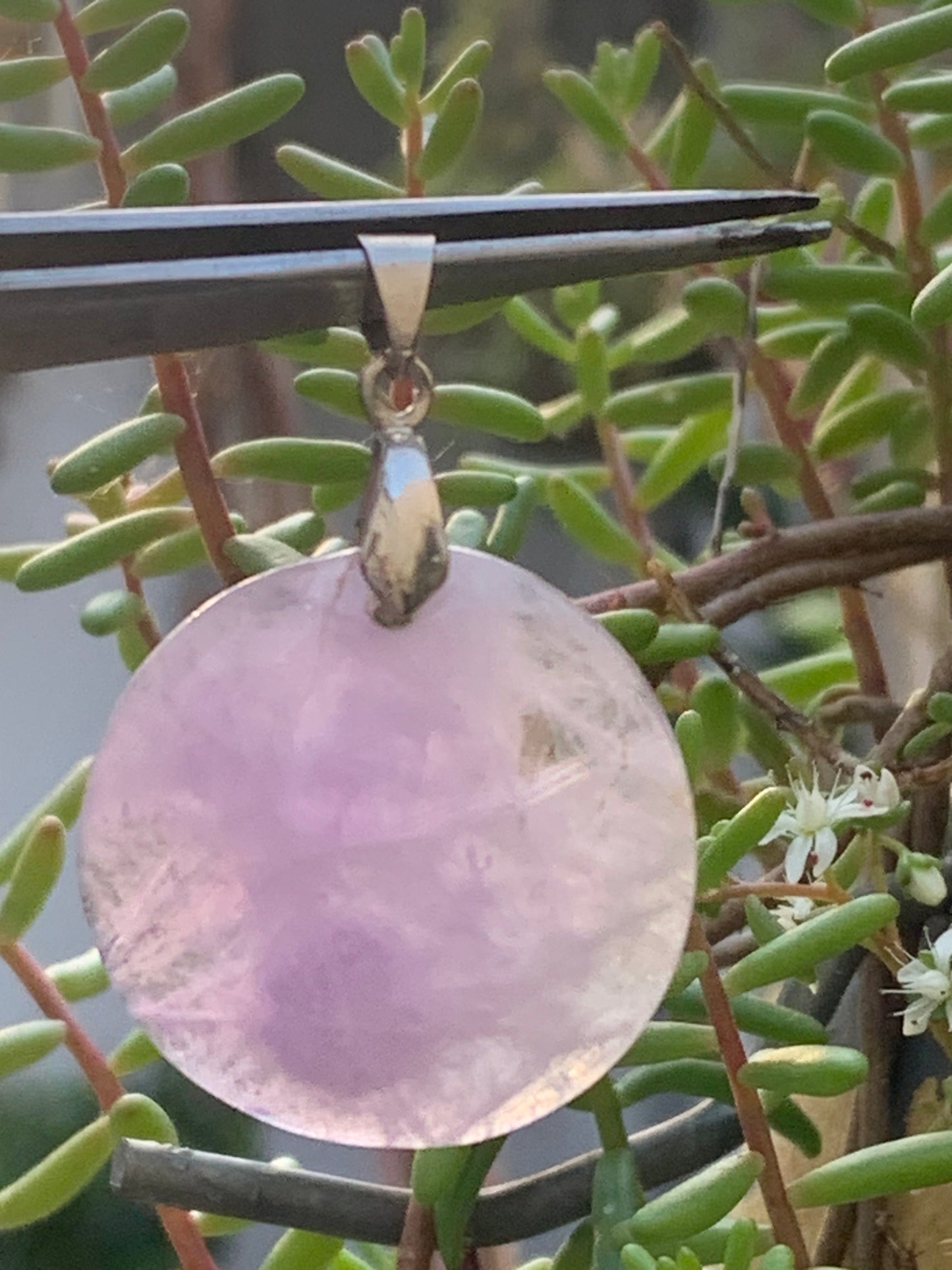 Amethyst, pendant measuring 40mm high x 30mm wide x 8mm thick. Sold with a free adjustable black cord!