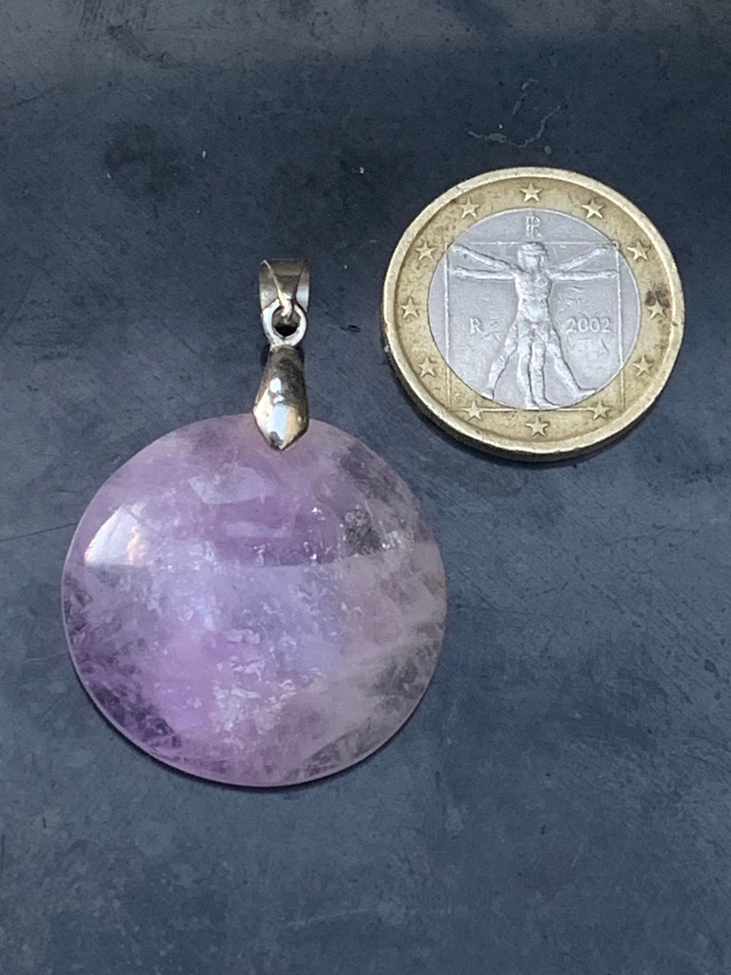 Amethyst, pendant measuring 40mm high x 30mm wide x 8mm thick. Sold with a free adjustable black cord!