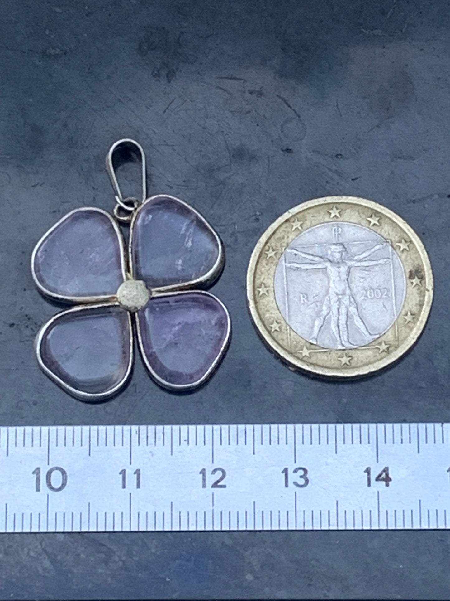 Amethyst, '4-leaf clover' pendant, 35mm high x 25mm wide x 4mm thick. Sold with a free adjustable black cord!