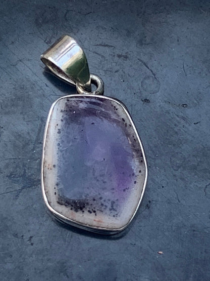 Amethyst 'super 7/ super seven', Silver pendant, 38mm high x 18 wide x 6 thick. Sold with a free adjustable black cord!