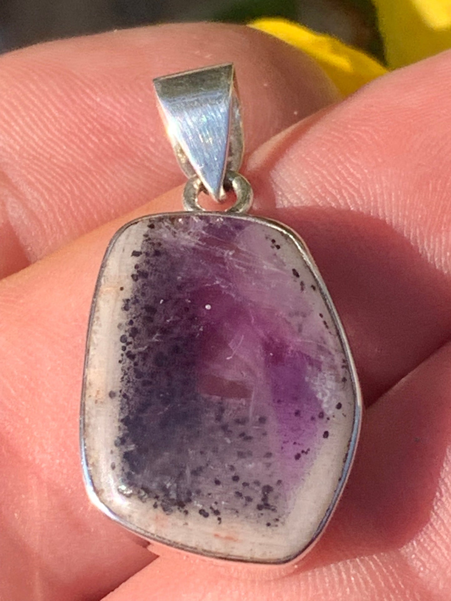 Amethyst 'super 7/ super seven', Silver pendant, 38mm high x 18 wide x 6 thick. Sold with a free adjustable black cord!