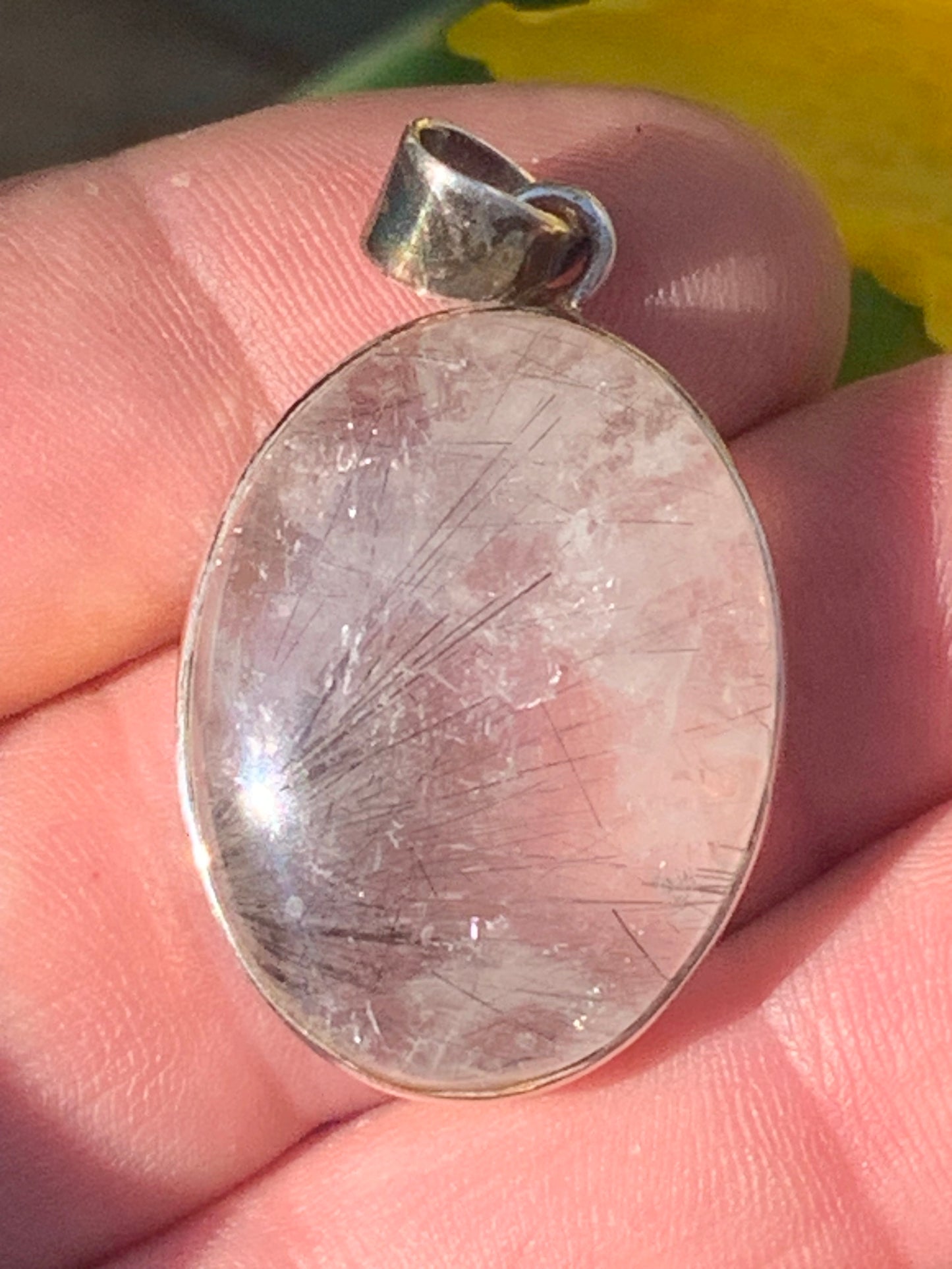 Rock crystal/quartz with black tourmaline inclusions! Silver pendant, 43 mm high x 25 mm wide x 10 mm thick. Sold with an adjustable black cord!