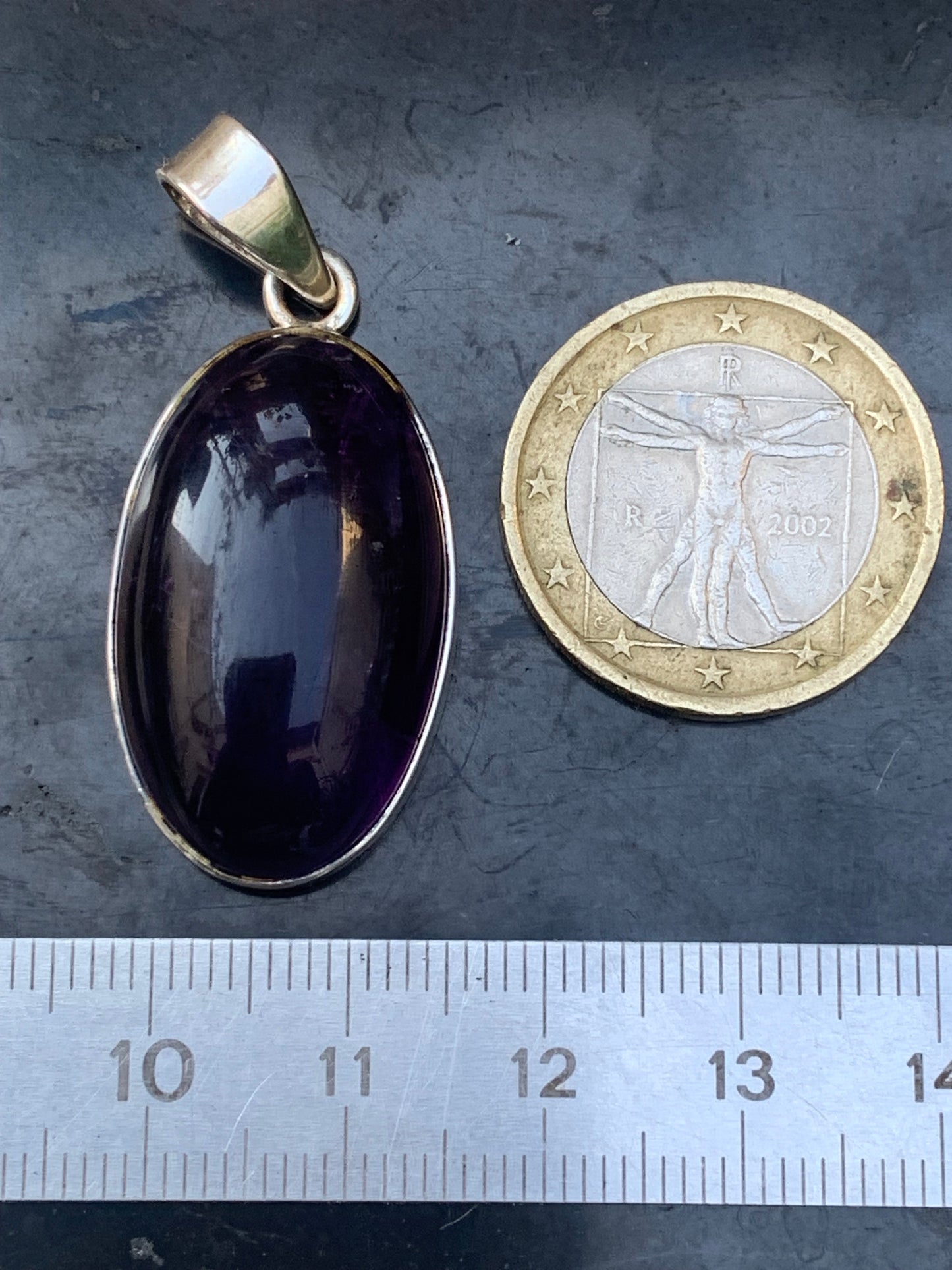 Amethyst, superb silver pendant measuring 42 mm high x 19 mm wide x 10 mm thick. Sold with a free adjustable black cord!