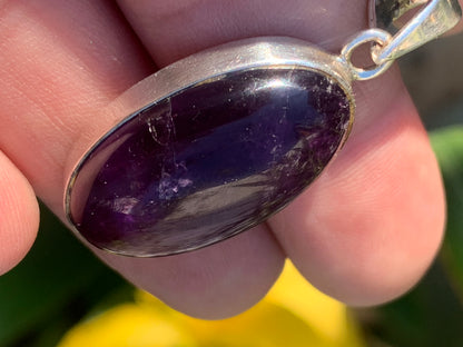 Amethyst, superb silver pendant measuring 42 mm high x 19 mm wide x 10 mm thick. Sold with a free adjustable black cord!