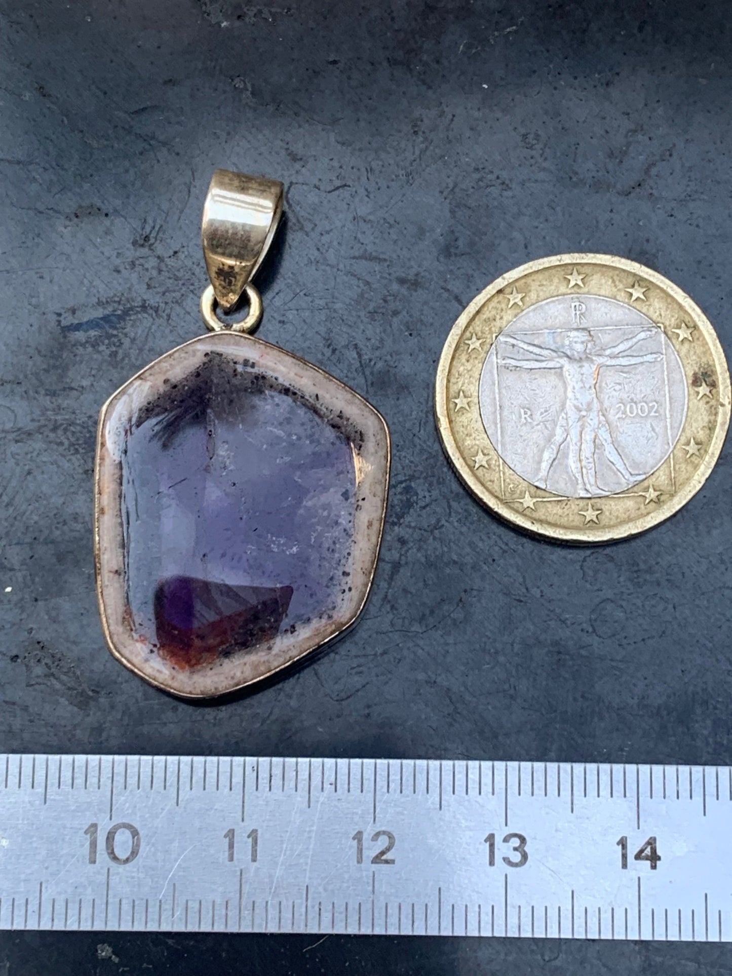 Amethyst 'super 7/ super seven', Silver pendant, 40mm high x 25mm wide x 6mm thick. Sold with a free adjustable black cord!
