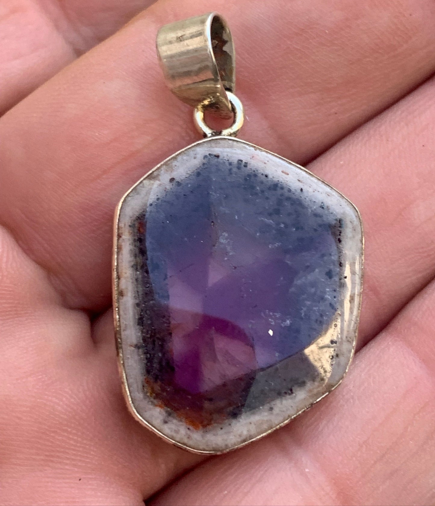 Amethyst 'super 7/ super seven', Silver pendant, 40mm high x 25mm wide x 6mm thick. Sold with a free adjustable black cord!