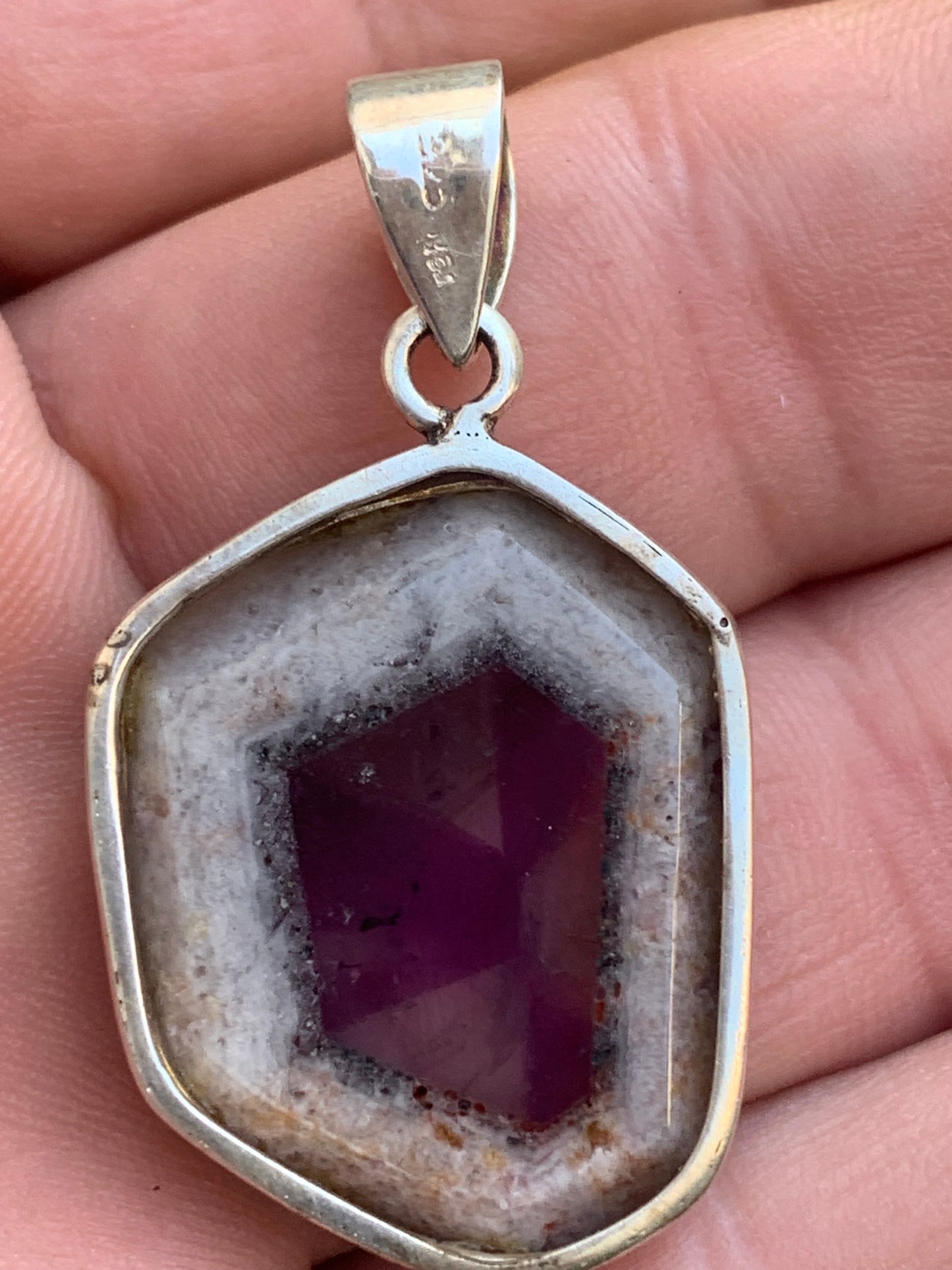 Amethyst 'super 7/ super seven', Silver pendant, 40mm high x 25mm wide x 6mm thick. Sold with a free adjustable black cord!