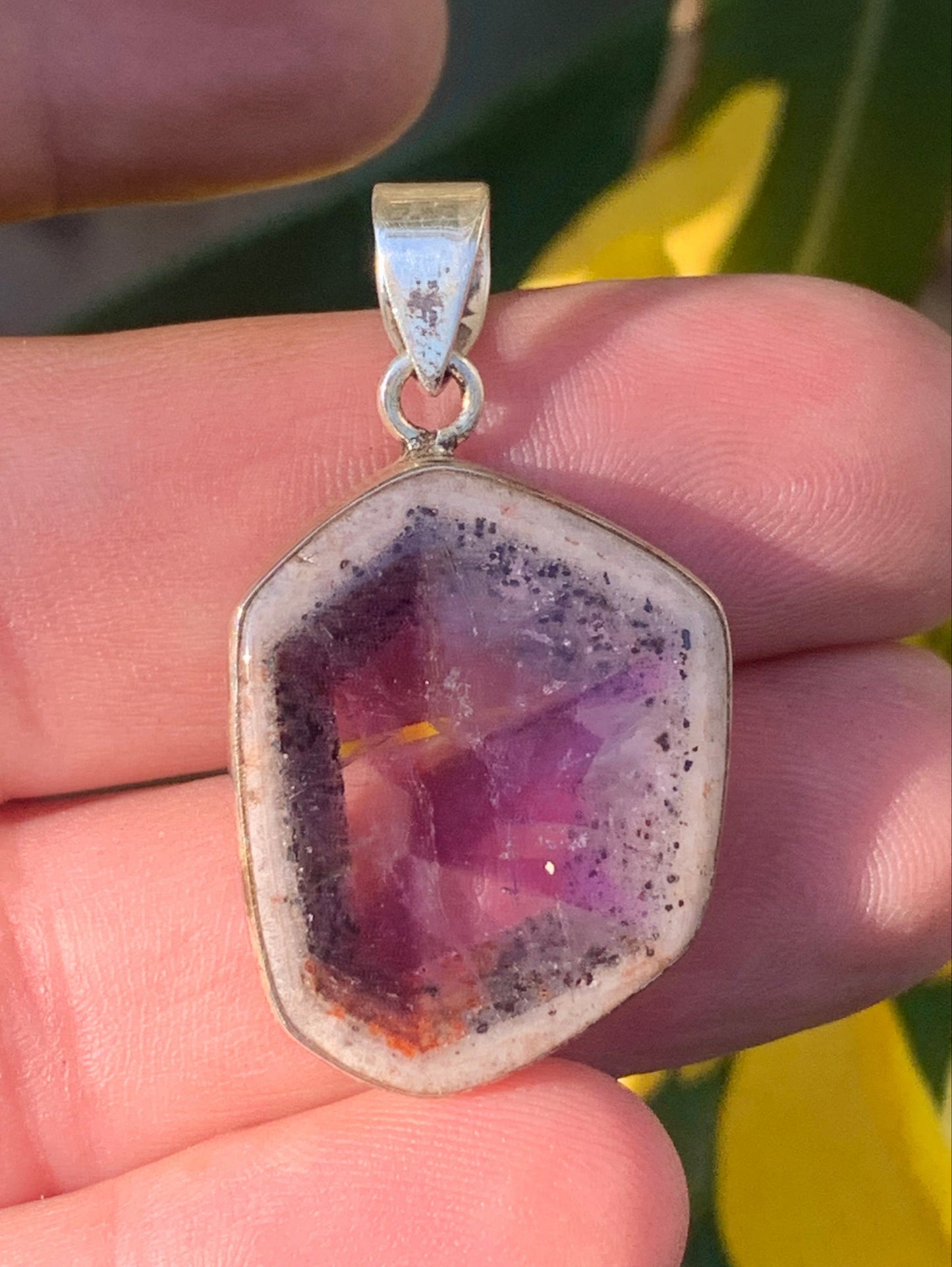 Amethyst 'super 7/ super seven', Silver pendant, 40mm high x 25mm wide x 6mm thick. Sold with a free adjustable black cord!