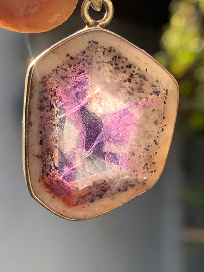 Amethyst 'super 7/ super seven', Silver pendant, 40mm high x 25mm wide x 6mm thick. Sold with a free adjustable black cord!
