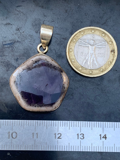 Amethyst 'super 7/ super seven', Silver pendant, 40mm high x 25mm wide x 6mm thick. Sold with a free adjustable black cord!