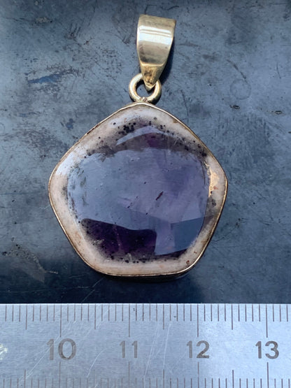 Amethyst 'super 7/ super seven', Silver pendant, 40mm high x 25mm wide x 6mm thick. Sold with a free adjustable black cord!