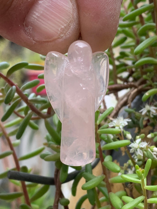 Rock crystal/Rose quartz! 'Angel' pendant measuring 40mm high x 18mm wide x 14mm thick. Sold with an adjustable black cord!