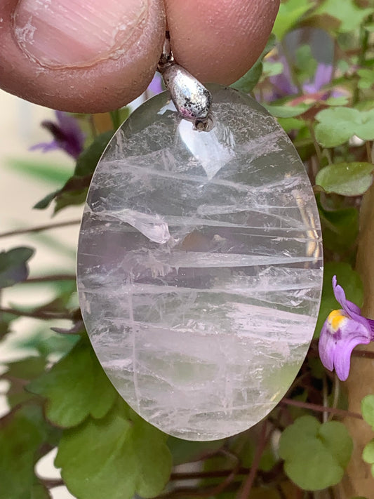 Rock crystal/Rose quartz! Pendant measuring 50mm high x 28mm wide x 8mm thick. Sold with an adjustable black cord!
