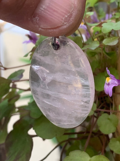 Rock crystal/Rose quartz! Pendant measuring 50mm high x 28mm wide x 8mm thick. Sold with an adjustable black cord!