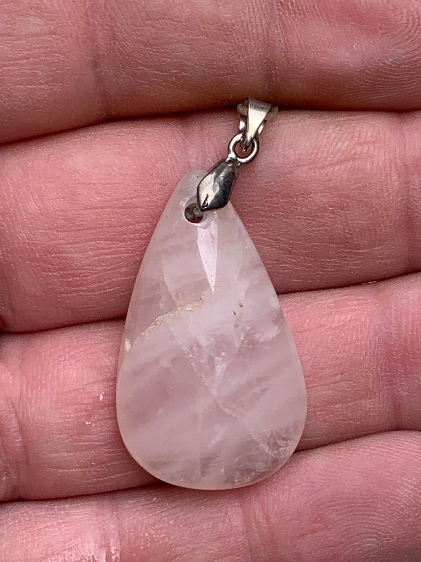 Rock crystal/Rose quartz! Pendant measuring 43mm high x 20mm wide x 8mm thick. Sold with an adjustable black cord!