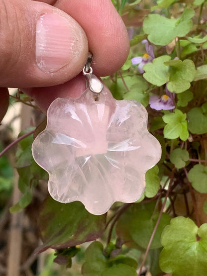 Rock crystal/Rose quartz! Pendant measuring 46mm high x 35mm wide x 8mm thick. Sold with an adjustable black cord!