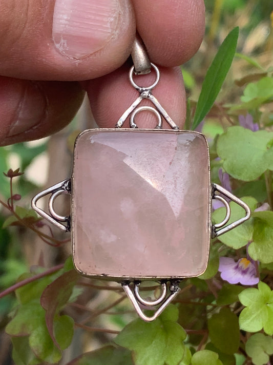 Rock crystal/Rose quartz! Pendant measuring 56mm high x 40mm wide x 8mm thick. Sold with an adjustable black cord!