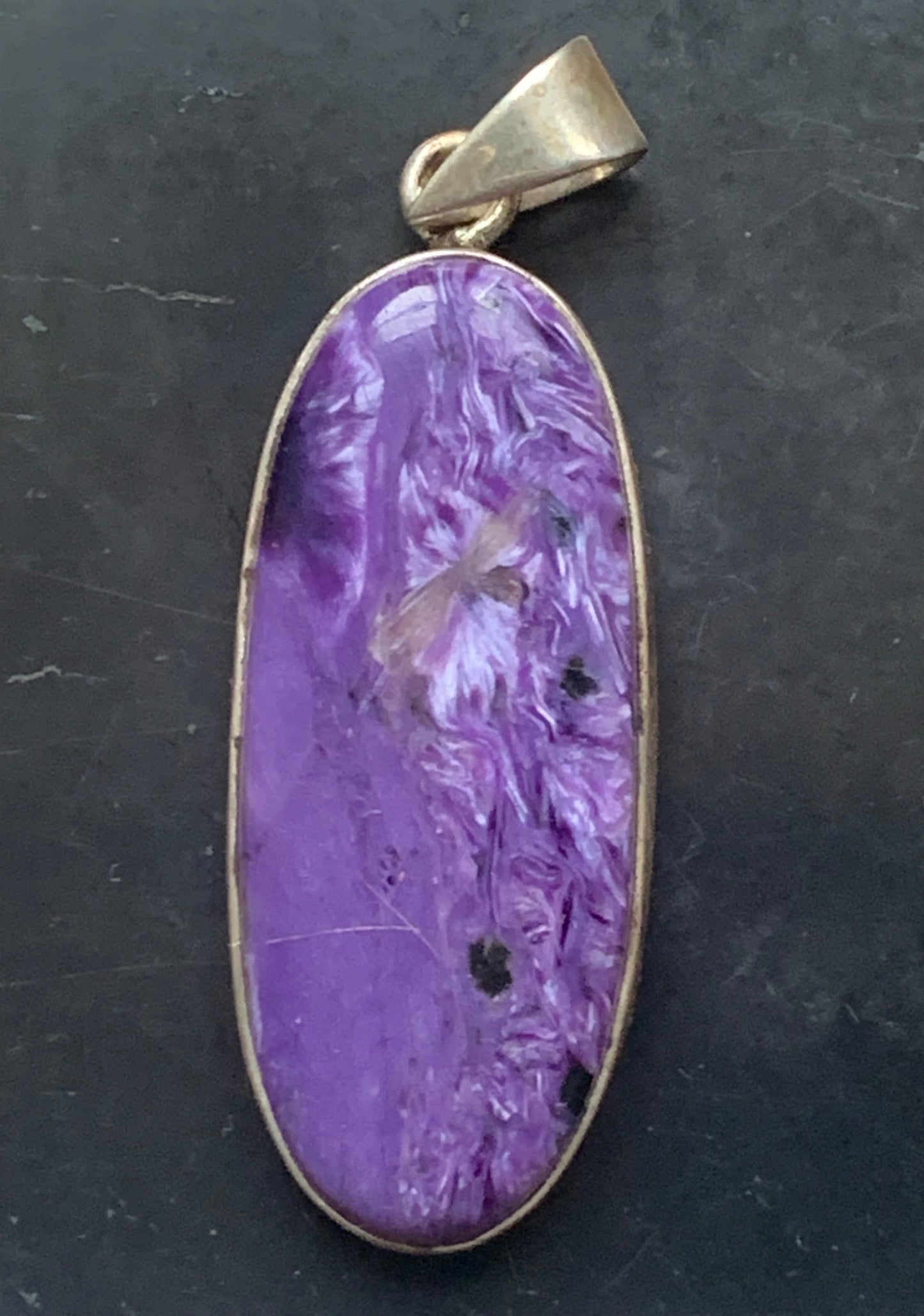 Charoite, magnificent pendant in 925 Silver, 52mm high x 18 wide x 8 thick. Sold with an adjustable black cord!