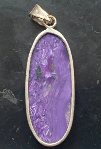 Charoite, magnificent pendant in 925 Silver, 52mm high x 18 wide x 8 thick. Sold with an adjustable black cord!