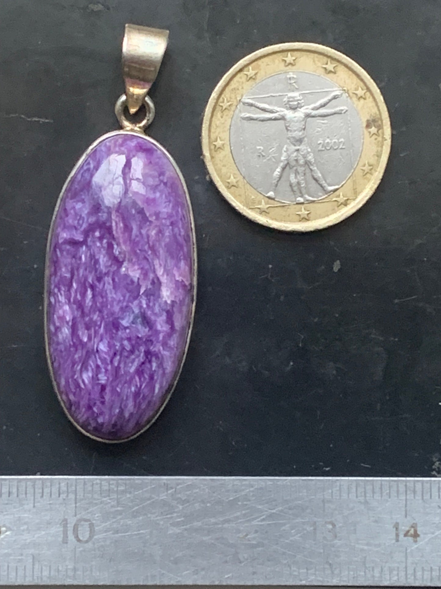 Charoite, magnificent 925 Silver pendant measuring 50mm high x 19mm wide x 9mm thick. Sold with an adjustable black cord!