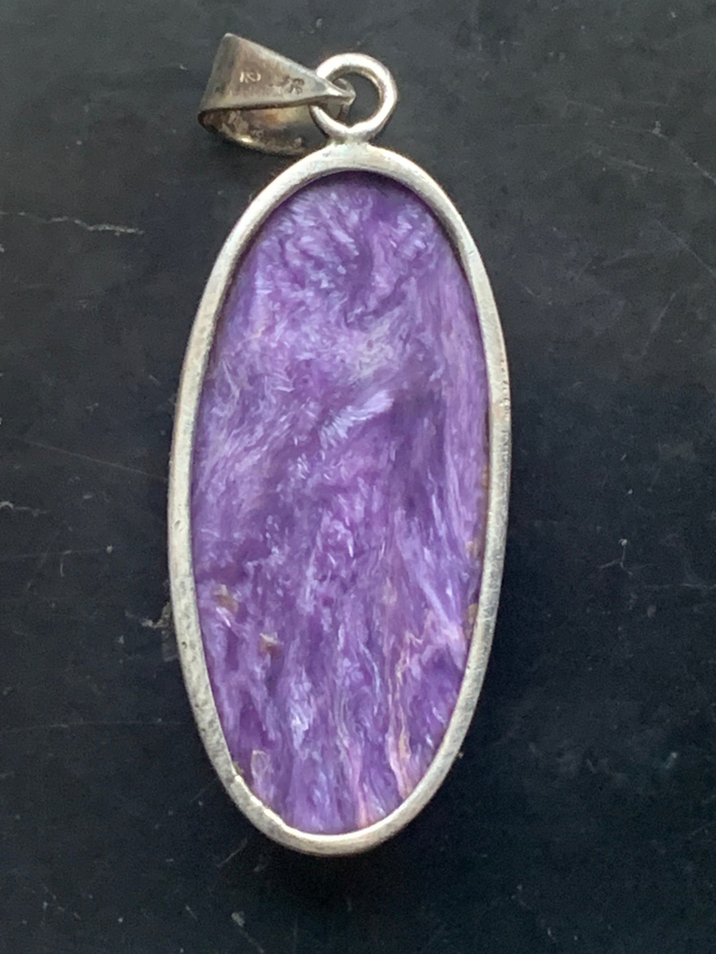 Charoite, magnificent 925 Silver pendant measuring 50mm high x 19mm wide x 9mm thick. Sold with an adjustable black cord!