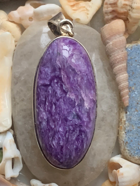 Charoite, magnificent 925 Silver pendant measuring 50mm high x 19mm wide x 9mm thick. Sold with an adjustable black cord!